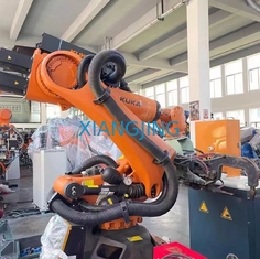 Używany robot Kuka KR120 R3200 z zaciskiem spawalniczym